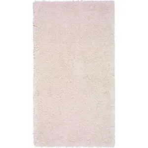 Světle béžový koberec Universal Aqua Liso, 57 x 110 cm